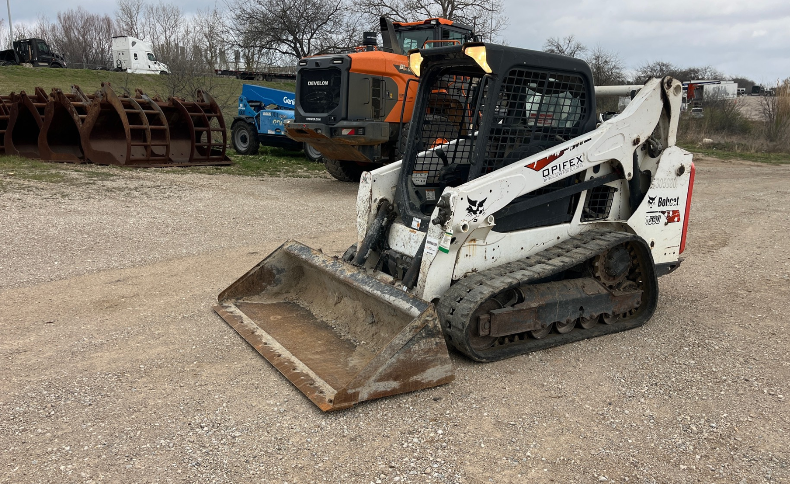 Compact construction equipment on a job site
